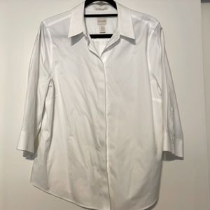 Chicos size 2 white button down no iron shirt, also buttons down back.